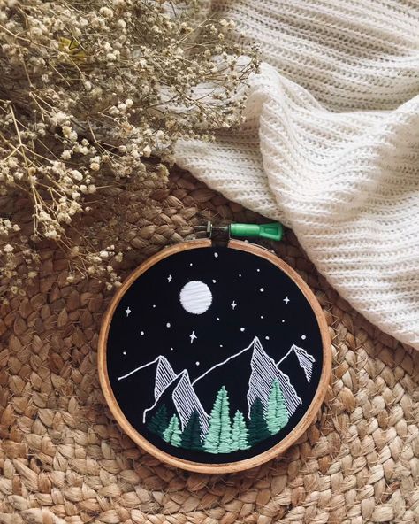 "Starlit"....🌕✨ How does it make you feel? I'd love to hear your thoughts! Share your favorite outdoor memory or tag a friend who would love to experience this kind of serenity.. 💫 #handembroidery #mountainview #starrynight #natureart #peacefulmoments #handcraftedwithlove #embroideryart #natureinspired #artwithheart Hand Embroidery Art,bNature-Inspired Embroidery, Mountain Scene Embroidery, Starry Night Art, Handmade Wall Decor, Embroidered Hoop Art, Custom Embroidery Design, Home Decor ... Camping Embroidery Designs, Embroidered Mountains, Scene Embroidery, Mountain Embroidery, Starry Night Art, Embroidered Hoop, Handmade Wall Decor, Visible Mending, Mountain Scene