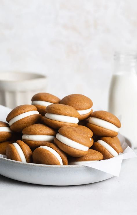 Mini Pumpkin Whoopie Pies | Browned Butter Blondie | Made with the perfect hint of cozy Fall spices and a sweet maple cream cheese frosting, these mini pumpkin whoopie pies recipe make the cutest bite-size dessert. Chock full of delicious pumpkin flavor, they’re easy to make and fun to eat! Pumpkin Whoopie Pie Recipe, Pumpkin Foods, Delicious Thanksgiving Desserts, Train Pumpkin, Whoopie Pie Recipe, Pumpkin Whoopie Pies, Fall Baking Recipes, Pie Cookies, Whoopie Pie