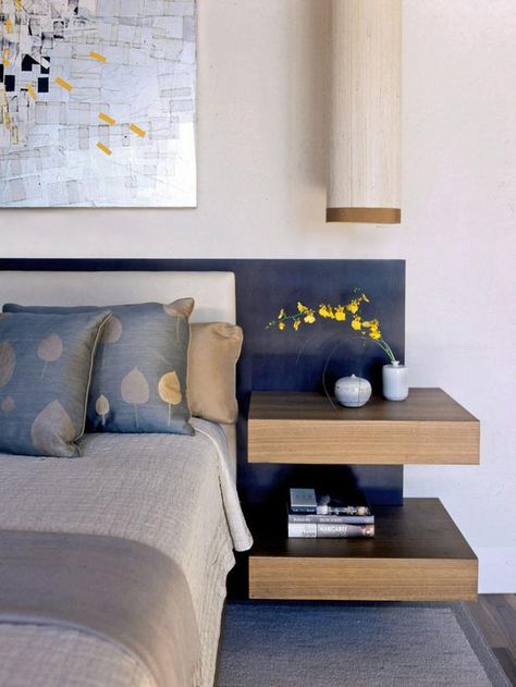 Build In Functionality - Tips for a Clutter-Free Bedroom Nightstand on HGTV . . . This cool headboard, with built in side tables actually conceals hidden drawers. Zen Bedroom Ideas, Floating Bedside Table, Floating Shelves Bedroom, Headboard With Shelves, Bedside Shelf, Zen Bedroom, Rustic Floating Shelves, Trendy Bedroom, Bedroom Night Stands