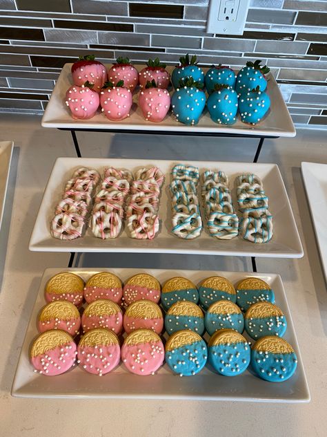 Sweets For Gender Reveal, Oreo Gender Reveal Cookies, Pretzel Gender Reveal, Pink And Blue Chocolate Covered Pretzels, Gender Party Food Ideas, Gender Reveal Deserts Ideas, Gender Reveal Ideas Food Snacks, Dessert Table Gender Reveal Ideas, Gender Food Reveal Ideas