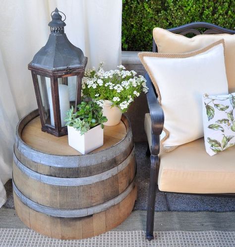 Front porch decor: half-whiskey barrel table, Lantern, flowers pulled, curtain = inviting. Diy Patio Ideas, Whiskey Barrel Table, Barrel Table, Patio Diy, Diy Outdoor Decor, Have Inspiration, Outside Living, Bourbon Barrel, Wine Barrel