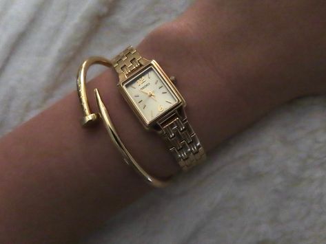 Dainty gold watch, rectangle watch, gold seiko watch, gold watch, gold jewelery, cartier nail bracelet, nail bracelet, gold nail bracelet, gold stack, gold watch and bracelet, watch aesthetic Cartier Rectangle Watch, Gold Dress Watch, Dainty Square Watch, Women’s Rectangle Watch, Gold Square Watches Women, Cartier Bracelet Nail, Seiko Essentials Watch, Delicate Gold Watch Women, Seiko Watches Women Gold