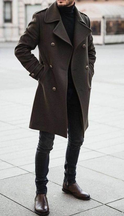 This mens winter fashion outfit is perfect for those trying to stay warm but also retain dapper gentleman style. Here we see a grey coat and turtleneck outfit paired with grey jeans and dark brown boots. If you want this trench coat custom made for you, book an appointment with us at Giorgenti! #mensfashion #gentlemensstyle #mensclassystyle Mens Fall Outfits, Winter Coat Outfits, Overcoat Men, Mens Overcoat, Trench Coat Outfit, Fall Outfits Men, Stylish Men Casual, Coat Outfit, Trench Coat Men