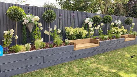 Raised Garden Beds Side Of House, Raised Bed Patio Border, Gardens With Raised Beds, Raised Flower Beds Ideas, Raised Sleeper Beds, Raised Beds Along Fence, Raised Bed Planting Ideas, Raised Garden Bed Fence, Garden Beds Along Fence