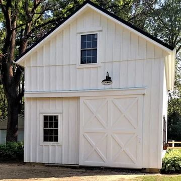 Windows With Grids, Garage Workshop Ideas, Board Batten Siding, Detached Garage Designs, Farmhouse Sheds, Sliding Garage Doors, Garage Plans With Loft, Shed Designs, Pole Barn Garage