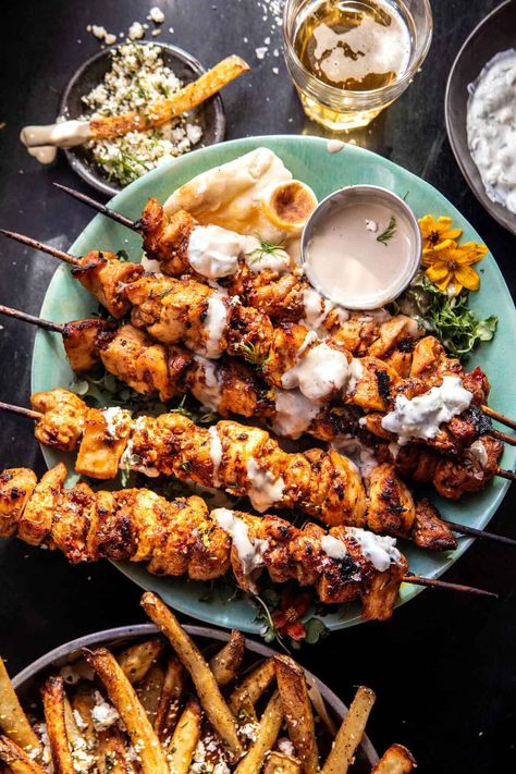 Chicken Tzatziki Skewers with Feta Fries: A spring GO-TO...add a side of homemade garlicky feta fries for a deliciously fun family dinner! Chicken Tzatziki Skewers With Feta Fries, Half Baked Harvest Chicken Skewers, Greek Chicken Kebab Recipe, Feta Fries, Chicken Tzatziki, Greek Chicken Skewers, Greek Grilled Chicken, Stick Food, Dinner Board