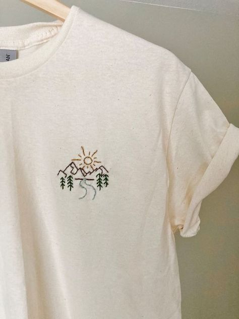 SUNRISE Tshirt Embroidery Design / Sun Rising Over Mountains Embroidered Landscape / Nature Lover Gift / the Great Outdoorsy Gift Men Women - Etsy Canada T shirt #tshirt t-shirt #t_shirt t shirts #tshirts t-shirts #t_shirts T shirt design #tshirtdesign T-shirt designs #t_shirtdesign T shirts designs #tshirtsdesigns 6.254 Cute Shirt Embroidery Ideas, Mountain Embroidery Tshirt, Outdoorsy Tshirt Design, Unisex Embroidery Designs, Diy Shirt Embroidery Ideas, Embroidered Tshirt Mens, Embroidery Ideas For Clothes, Embroidery Outdoorsy, Mens Embroidered Sweatshirt