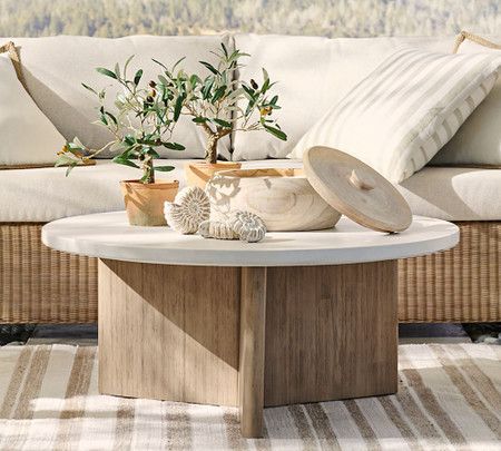 Pomona Indoor/Outdoor 38'' Concrete & FSC® Acacia Round Coffee Table | Pottery Barn Canada Round Patio Coffee Table, Round Cement Coffee Table, Outdoor Coffee Table Styling, Outdoor Coffee Table Ideas, Outdoor Coffee Table Decor, Outside Coffee Table, Round Stone Coffee Table, Round Coffee Table White, Outdoor Round Coffee Table