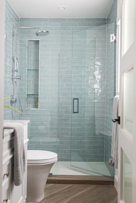 Aqua Subway Tile Bathroom, Aqua Shower Tile Ideas, Glass Tile In Bathroom, Be Achy Bathroom, Shower Tile Ideas Beach House, Coastal Bathroom Penny Tile, Vertical Subway Tile Small Bathroom, Small Beach Bathroom Ideas Modern, Beach House Shower Ideas