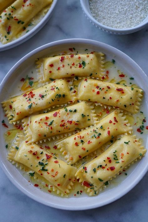 Roasted Garlic & Whipped Ricotta Agnolotti in a parmigiano butter sauce with crushed red chili flakes Chili Oil Garlic Butter Pasta, Filled Pasta Recipes, Ravioli Filling Ideas, Pasta Filling, Pasta Table, Semolina Flour, Garlic Confit, Whipped Ricotta, Italian Parsley