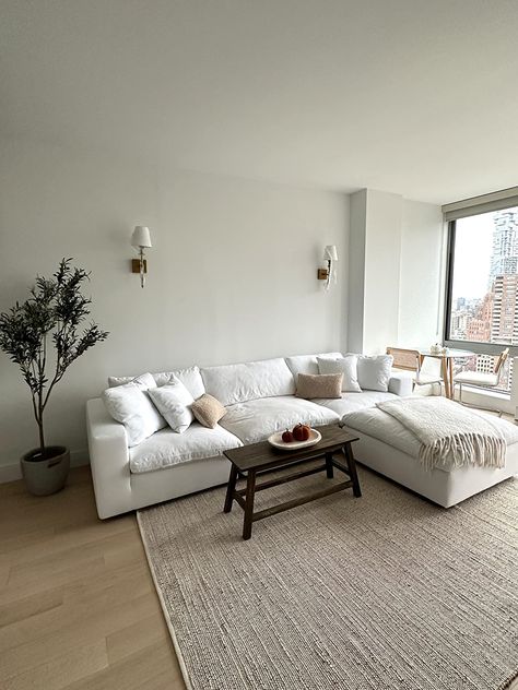 Cloud Sofa Apartment, White Cloud Couch Living Room Decor, Minimal Couches Living Room, Cloud Couch Small Living Room, Neutral Living Room Rugs On Hardwood, Cloud Sectional Living Room, Cloud Couch Living Room Decor, Living Room Cloud Couch, Cloud Sofa Living Rooms