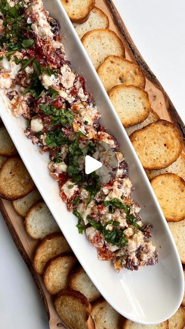 Ashley Lamego ♥ on Instagram: "Ep.9 Holiday Dinner Series: Goat Cheese Spread ✨

1 large goat cheese log (300 grams) 
1/2 cup or Kalamata olives (roughly chopped) 
1/2 cup of sundried tomatoes (roughly chopped) 
2-3 garlic cloves (finely chopped) 
2-4 tbsp of olive oil 
2-4 tbsp of balsamic vinegar (use your discretion) 
Salt and pepper for seasoning 
5-6 basil leaves chopped for garnish 

To a large bowl combine all your ingredients. Store in the fridge until ready to serve 
Top with fresh Basil 
Serve with baguette crisps / other cracker variety of choice 
Enjoy 😊 

#fyp #foryou #recipe #recipes #recipeoftheday #recipereel #recipeshare #healthy #healthyeating #food #foodie #foodblog #foodshare #foodblogger #toronto #ontario #easyrecipe #holidaydinnerseries #holidayappetizers #holidays # Goat Cheese Sundried Tomato Appetizer, Savoury Dips, Goat Cheese Log, Goat Cheese Spread, Olive Oil Crackers, Tomato Appetizers, Party Nibbles, Goat Cheese Dip, Nibbles For Party