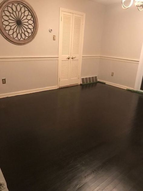 We bought a new house in July. Our floors were painted with a buttery color yellow. They were not in good condition to begin with and the estimates to replace them were close to $2k for our dining room/living room combination. I decided to take matters into my own hands and find an easier, more cost effective solution. The floors were painted, but I really didn’t want to repaint them. I also didn’t want to sand them down and restain them. So I did a little research on using gel stain. Unlike reg Painted Wood Floors Living Room, Painted Floors Wood Old Houses, Gel Stain Wood Floors, Painting Old Wood Floors, Wood Floor Paint Colors, Painted Floor Colors, Gel Stain Floor, Painted Hardwood Floors Old Houses, Painting Hardwood Floors