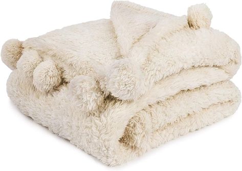 11 Barefoot Dreams Blanket Alternatives That Are Less Expensive – SheKnows Pom Pom Throw Blanket, Warm Blankets Cozy, Beige Throws, Cream Throw, Pom Pom Throw, Pom Pom Blanket, Decorative Throws Blanket, Couch Throw Blanket, Soft Sofa