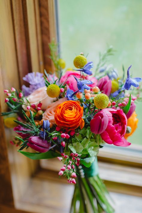 Simply spring wedding bouquet. Photo courtesy of Pixel Perfection Multi Color Bouquet, Rainbow Bouquet Wedding, Bright Wedding Flowers Bouquet, Colorful Summer Wedding Flowers, Bright Wedding Color Schemes, Small Bridesmaid Bouquet, Colorful Flowers Wedding, Bright Bridal Bouquet, Wildflower Arrangements