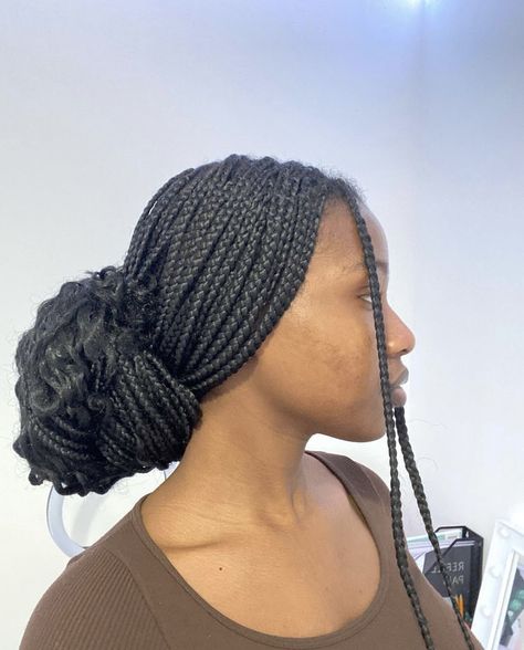 Braids Low Bun For Black Women, Box Braids In Low Bun, Braided Bun Aesthetic, Low Braid Bun For Black Women, Low Bun On Braids, Low Bun Box Braids Hairstyles, Low Bun Braids For Black Women, Low Bun Knotless Braids, Low Bun With Box Braids