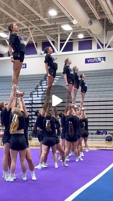 Douglas County HS Cheer on Instagram: "Trending way UP with @provencheer this summer 💜❤️💙 Another fantastic workshop to kick off our season, we are very hungry for the work ahead 🤠 #CountOnCounty #mtdchs #highschoolcheer #provencheer #cheer" Herkie Jump Cheerleading, Cheer Stunts Pictures, Two Stunt Group Pyramids, Cheer Mom Aesthetic, Cheer Pyramids High School, Cheer Stunts Middle School, High School Cheer Stunts, Cheer Stunts High School, Stunts Cheer