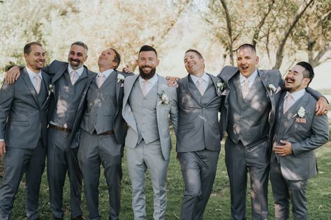 Groom Different Tie Than Groomsmen, Groomsmen Tuxedos Grey, Grey Groom Blue Groomsmen, Grey Best Man Suit, Groomsmen With Different Suits, Grooms In Grey Suits, Silver Groomsmen Attire, Groomsmen Attire Blush Color Schemes, Wedding Grey Suits Groomsmen