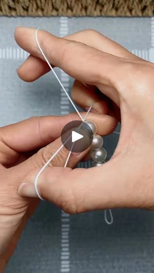 686K views · 8.2K reactions | Learn how to tie a simple but beautiful pearl bracelet #diy #bracelet #crafting | Craft 1 Minute | Craft 1 Minute · Original audio Diy Pearl Necklace, Diy Friendship Bracelets Tutorial, Friendship Bracelets Tutorial, Pearls Diy, Jewelry Knots, Fiber Jewelry, Bracelet Knots, Friendship Bracelets Diy, Knot Bracelet