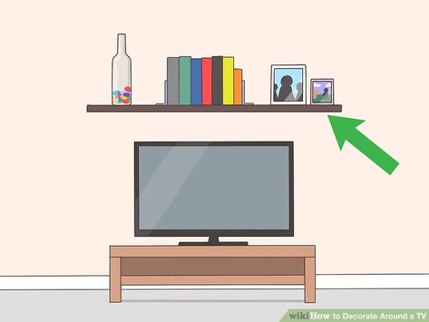 3 Ways to Decorate Around a TV - wikiHow Tv On Stand Decor, Wall Shelves Over Tv, Decoration Over Tv, Shelving On Side Of Tv, How To Decorate Short Tv Stand, Floating Shelf Above Tv Living Room, Tv On Tv Stand Living Room, Boho Decor Around Tv, Shelf Over Tv Decor