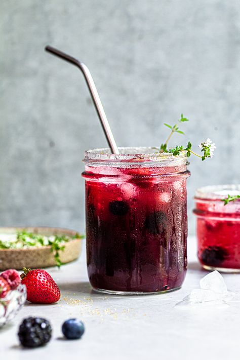 These berry spritzer mocktails are made with homemade berry simple syrup, lemon juice, a few sprigs of thyme and sparkling water. Easy, super refreshing and so tasty, this bubbly berry lemonade is the perfect balance of tart and sweet. Berry Lemonade, Berry Drinks, Lemon Thyme, Berry Juice, Pretty Drinks, Indulgent Desserts, Mocktail Recipe, Summer Drink, Pancakes And Waffles