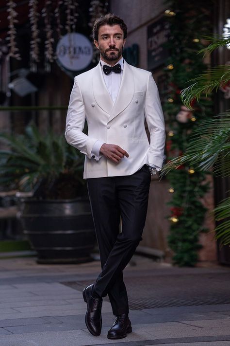 Radiate pristine sophistication in the White Double-Breasted Tuxedo 2-Piece by VIOSSI, featuring a classic double-breasted design tailored for timeless elegance in a striking, immaculate white hue. #whitetuxedo #doublebreastedtuxedo #VIOSSI #mensfashion #timelesselegance #sophisticatedlook #tuxedostyle #classicwhite Tuxedo For Men White, Double Breasted Suit Men, Designer Tuxedo, White Wedding Suit, Suit Styles, Double Breasted Tuxedo, Suit Stores, Tuxedo Shoes, Slim Fit Suit Men