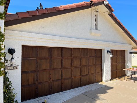 Wood Spanish colonial custom garage door arizona Spanish Garage, Colonial Garage, Brown Garage Door, Garage Woodshop, Curve Building, Garage Door House, Wood Garage, Modern Garage Doors, Texas Home Decor