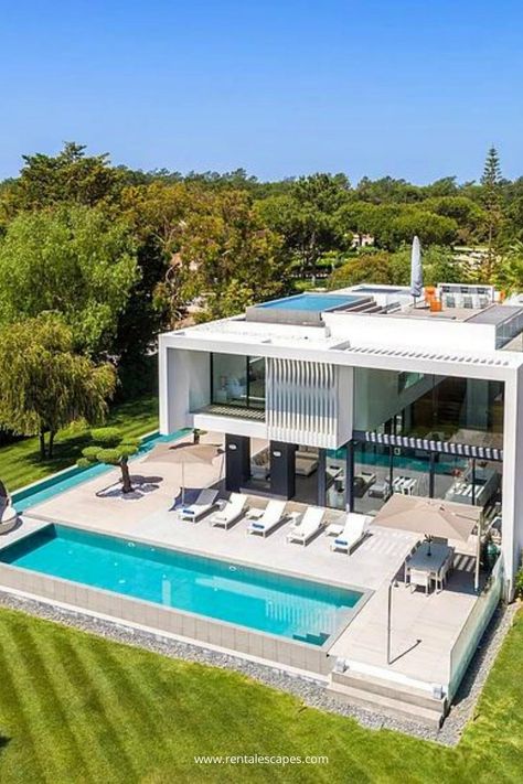 A contemporary villa of exceptional high standing, a showcase for modern design. Located in Quinta da Lago. 📍 Villa Conquistador, Portugal . . . #rentalescapes #luxurytravel #luxuryhomes #secretdestination #portugal #luxurylifestyle #luxurydestinations Portugal Villa, Poolside Lounge Chairs, Stove Top Burners, Poolside Lounge, Contemporary Villa, Luxury Villa Rentals, Luxury Destinations, Lap Pool, Cinema Room