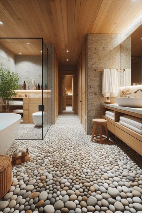 Bring the outdoors in with these natural pebble tiles. Create a spa-like atmosphere right in your own bathroom. #PebbleTiles #SpaInspired Pebble Tile Shower Ideas, Pebble Floor Bathroom, Bathroom Tiles Ideas, Pebble Tile Shower, Large Shower Tile, Pebble Tiles, Modern Floor Tiles, Recycled Glass Tile, Small Bathroom Tiles