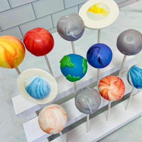 Solar System Cake Pops, Planets Cake Pops, Space Strawberries, Cake Pop Planets, Space Theme Cakepops, Planet Cakes Solar System, Solar System Themed Birthday Party, Outer Space Cake Pops, Solar System Birthday Party Ideas