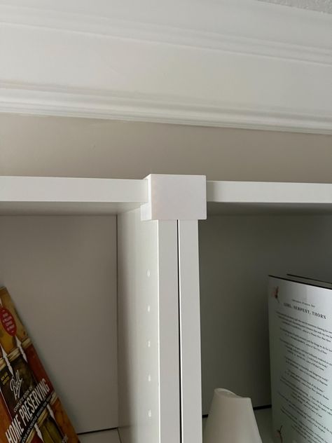 Ensure your IKEA Billy bookshelves stay perfectly aligned with our Hook Clip. Designed to fit seamlessly onto your bookshelves, this clip provides a secure pressure fit that keeps adjacent shelves straight and aligned. Available in white, black, and walnut, it complements the various IKEA Billy bookshelf colors. Features: Perfect Alignment: Keeps adjacent shelves straight and aligned for a neat and organized look. Easy Installation: Slides on and fits snugly, applying pressure to maintain alignm Ikea Bookcase Lighting, Billy Bookcase In Office, Billy Bookcase Master Closet, Hiding Shelf Brackets, Billy Bookcase Styling Bedroom, White Billy Bookcase Glass Doors, Billy Bookcase Clothes Storage, Billy Bookcase Tv Stand, Ikea Billy Bookcase Closet