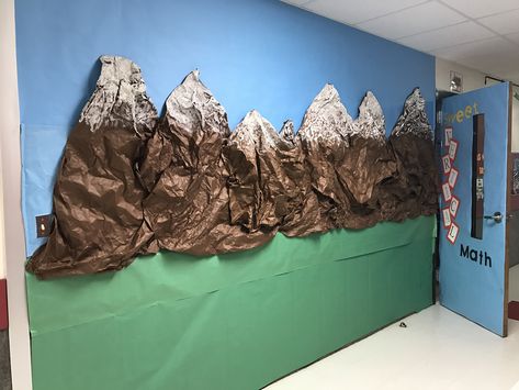 Mountains bulletin board - brown paper and white paint Paper Pine Trees Classroom, Mountain Climbing Classroom Theme, Construction Paper Mountains, How To Make A Mountain Out Of Paper, Together We Can Move Mountains Bulletin Board, Mountain Party Decorations, Mountain Display Classroom, Mountain Hallway Decor School, Faith Can Move Mountains Bulletin Board