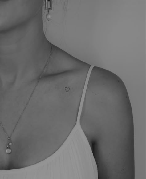 Collar Bone Heart Tattoos For Women, Small Tattoos Clavicle, Open Heart Tattoo On Collar Bone, Small Heart Tattoo On Neck, Initial Tattoo On Collar Bone, Collar Bone Minimalist Tattoo, Heart Tattoo On Collar Bone Simple, Colar Bone Heart Tattoo, Small Heart Collar Bone Tattoo