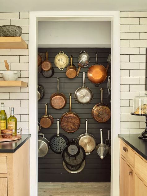 10 Ways to Organize Pots and Pans When Your Cabinet Space Is Limited Organize Pots And Pans, Cookware Display, Kitchen Wall Organizer, Cookware Storage, Pan Storage, Hanging Pans, Mediterranean Kitchen, Pot Rack Hanging, Pot Storage