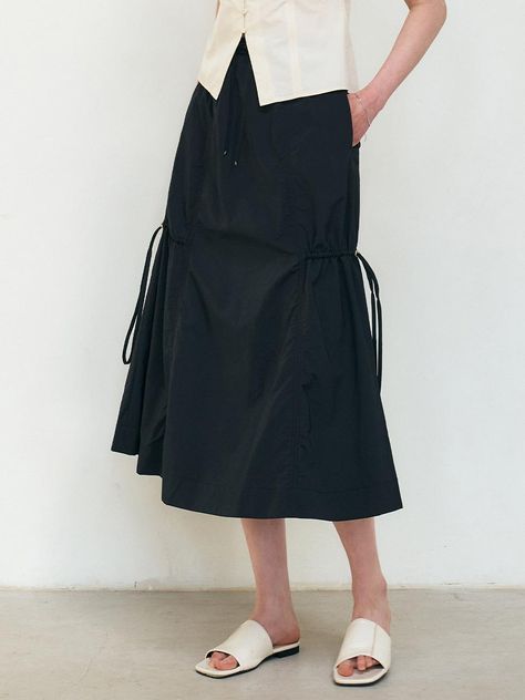 Loose-fit, calf-length flare skirt in nylon. Trimmed waistband with a drawstring and covered elastic and adjustable drawstring at sides. Lined.- Midi- Regular waist- Loose fit- A-line Elastic Waistband Skirt, Indian Summer, Summer 24, Fall 2024, Flare Skirt, Fashion Clothes, Get Dressed, Long Skirt, Fashion Inspiration