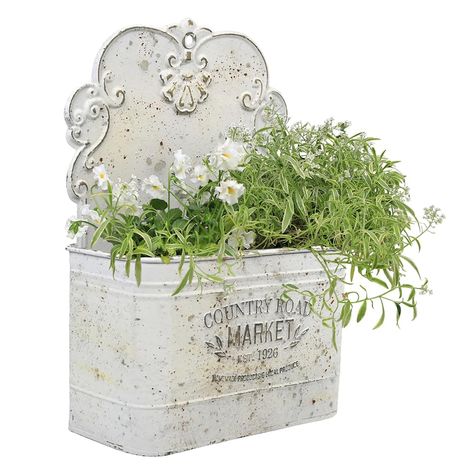 PRICES MAY VARY. WALL POCKET PLANTER: Rustic metal wall planter antique blue color for home, office, business use decor,farmhouse wall decor (plants not included). MULTI PURPOSE: The hanging wall planters holds plants, flowers, floral arrangements, seasonal decorations, holiday greenery, artificial plants, shrub bouquet, foliage, and more — Suitable for indoor/outdoor rustic wall decor. VINTAGE DESIGN: The wall planter outdoor create your own unique decor inside this gorgeous distressed wall con Wall Mounted Planters Outdoor, Wall Plant Decor, Farmhouse Decor Living Room Wall, Bouquet Foliage, Shutters Decor, Wall Mount Planter, Rustic Shabby Chic Decor, Windowsill Decor, Clay Moulds