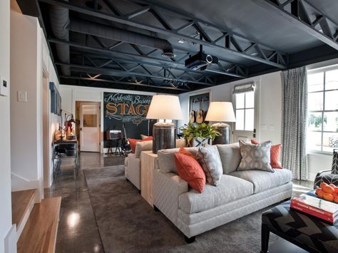 Looking to revamp your boring basement? Check out these 13 amazing spaces for inspiration at HGTV.com. Industrial Basement, Basement Paint Colors, Urban Industrial Decor, Basement Painting, Basement Construction, Basement Office, Basement Living, Basement Inspiration, Small Basements