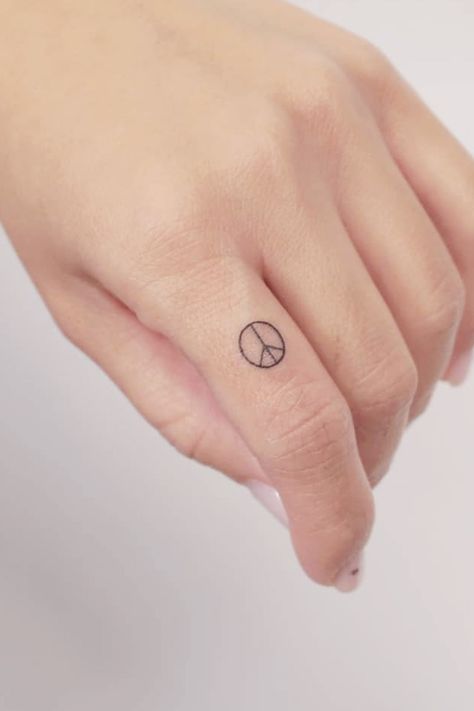 Peace Tattoos For Women Symbols, Peace Symbol Tattoos For Women, Peace Finger Tattoo, Peace Tattoos For Women, Peace Tattoo Designs, Peace Symbol Tattoo, Peace Sign Tattoo, Peace Tattoo, Peace Sign Tattoos