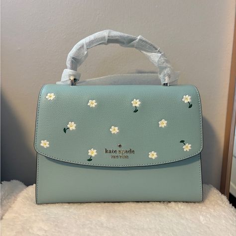 Kate Spade Top Handle, Embroidered. Brand New. Smoke Free; Pet Friendly Home. 7.13"H X 9.63"W X 3.5"D (Bottom) 7.13"H X 9.63"W X 2"D (Top) Handle Drop: 2.88" Strap Drop: 22" Refined Grain Leather Metal Pinmount Logo Two Way Spade Jacquard Lining Interior: Front & Back Zip Pocket Exterior: Back Slip Pocket Flap With Magnetic Snap Closure Kate Spade Style, Girly Bags, Pretty Bags, Kate Spade Purse, Cute Purses, Satchel Purse, Kate Spade Handbags, Cute Bags, Kate Spade Bag