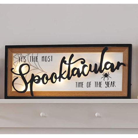 Celebrate the Halloween season with this spooktacular sign. Lit with 7 warm white LEDs. Uses 2 AA batteries n...Buy Now, Pay Later with Ginny's Credit Shopping! Halloween Sign Cricut, Long Halloween Sign, Spooky Signs For Halloween, Cute Halloween Signs Diy, Coffin Sign Halloween, Wood Halloween Signs, Halloween Sign Ideas, Cute Halloween Signs, Halloween Signs And Sayings