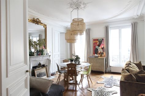 See How the Coolest Parisians Really Live | The Study Dining Room Paris, Contemporary French Living Room, Eclectic Parisian Apartment, Parisian Family Room, Parisian Apartment Dining Room, French Apartment Dining Room, Small Parisian Apartment Decor, Parisian Minimalist Style Home, French Apartment Living Room