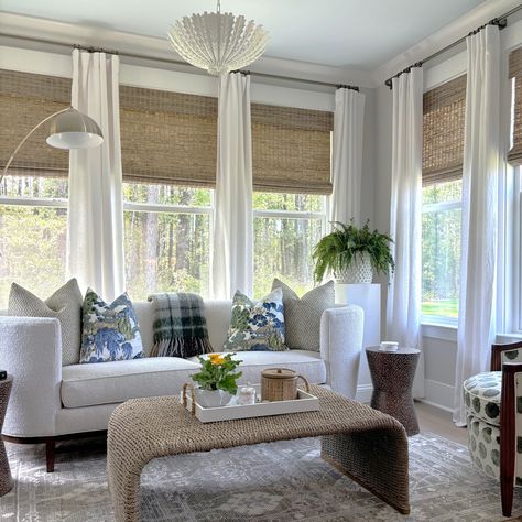 An enclosed sunroom will give you all the delights of a screened in porch but without the insects that can ruin your glass of wine! We love doing sunrooms! 
Reach out today for a quick call to see what we can do for you! #sunroomdesign#cozylivingroomideas#lightingideas #wovenshades #arearug #indoorplants #blueandwhite #plaidpillowcover #whitecurtains#boucle#sunroom#sunroomideas #accentchair #kitchenreno #sunroomidea#porchdecor #mydomaine #sodomino #coastal #whitesofa#coastalvibes #coastaldesign Curtains In Sunroom Window, White Sunroom Ideas, Lakehouse Sunroom, Sunroom Ideas Plants, Sunrooms Ideas Decorating, Sunroom Curtain Ideas, Enclosed Sunroom Ideas, Coastal Sunroom, Sunroom Curtains