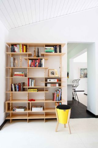 We love our loft apartment, but it only has one closet. So we have to get creative with clothing and book storage. A large shelf was a good solution for stacking... Adjustable Bookshelf, Plywood Shelves, Large Shelves, Small Shelves, Plywood Furniture, Loft Apartment, Bookcase Shelves, Design Del Prodotto, Design Living Room