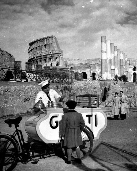 A child purchases ice cream from a vendor in Rome, near the ruins of the Colosseum - 1940. London Paddington Station, Havasu Falls, Angkor Wat Temple, Mermaid Statues, Sands Hotel, Rome Antique, Grand Central Terminal, Grand Central Station, The Colosseum