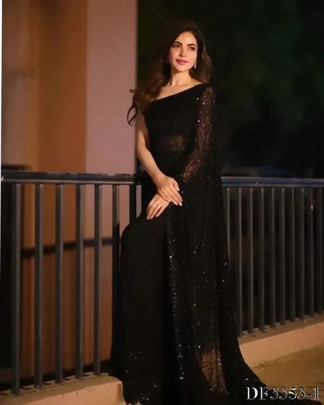 Step into the spotlight with our Radiant Sequins Elegance Georgette Saree. This exquisite black saree, adorned with shimmering sequins, exudes sophistication and grace. Perfect for evening events or special occasions, it offers a blend of modern glamour and traditional beauty. Draped in this georgette masterpiece, you'll feel confident and radiant, capturing everyone's attention effortlessly. Available now 🤩For order and more details. You can dm me. https://fashion.sapnaaz.com/product/radia... Yrkkh Abhira, Indian Ethnic Wear For Women, Indian Wedding Gowns, Simple Saree Designs, Fancy Sarees Party Wear, Ethnic Wear For Women, Simple Sarees, Saree Designs Party Wear, Indian Fashion Saree