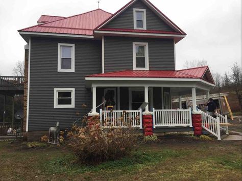 siding and roof color Houses With Burgundy Metal Roof, Red Tin Roof House Colors, Red Metal Roof House Colors, Houses With Red Metal Roofs, House Colors With Red Roof, Grey House With Red Roof, Maroon Roof House Colors, House Exterior Red Roof, Red Metal Roof Houses