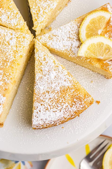 You're really going to enjoy this sublime lemon ricotta cake. It has a wonderfully light and fluffy texture and it's made with simple ingredients such as ricotta and lemon. This cake makes a great afternoon sweet treat or you can have it for dessert. Once you've combined the ingredients you can bake it and smell all those appealing aromas floating tantalizingly out of the oven! If you love citrusy flavors and easy desserts, you are going to want to make this cake for sure! Ricotta Cake Recipes Italian, Italian Lemon Ricotta Cake, Lemon Ricotta Cake Recipes, Ricotta Cake Recipes, Delicious Lemon Cake, Italian Desserts Traditional, Lemon Ricotta Cake, Italian Recipes Dessert, Ricotta Cake