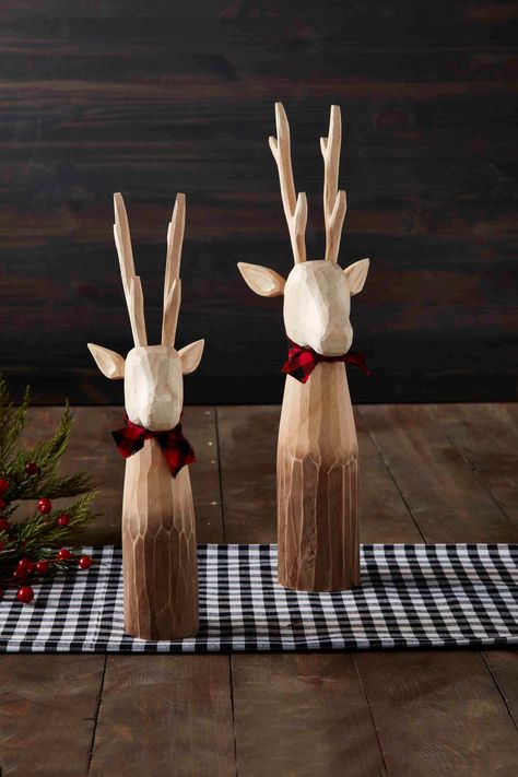 Create the coziest Christmas environment with our Small Decorative Deer Sitter. The carved wooden deer sitter features bark-like texture. The deer sitter features the most unique details and the reindeer is wearing a cotton bow. Make sure to pair with our other decorative deer sitters for a matching set. | Mud Pie Small Decorative Deer Sitter in Brown | Pine Wood Christmas Environment, Wooden Deer, Simple Wood Carving, Deer Ornament, Wood Stars, Plaid Bow, Christmas Wood, Mud Pie, Cozy Christmas