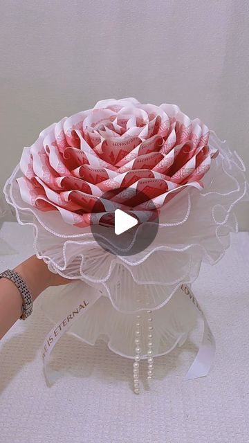 Paper Craft Ideas on Instagram: "Join us for a unique and delightful crafting adventure as we transform ordinary money into stunning bouquets! In this captivating DIY tutorial, we'll show you step-by-step how to fold, shape, and arrange bills into beautiful floral arrangements that are perfect for any occasion. Whether you're celebrating a birthday, graduation, or wedding, these money bouquets add an extra touch of elegance and thoughtfulness to your gift-giving. With just a few simple materials and a bit of creativity, you'll learn how to create eye-catching designs that are sure to impress. Watch the video now and discover the art of crafting money into memorable gifts! 🌸💵✨" Money Gifts Creative Birthday, Simple Money Bouquet, How To Fold Money For Gifts, How To Make Money Bouquet, Wedding Money Gift Ideas, Diy Money Bouquet Ideas, Flower Bouquet With Money, Money Bouquet Birthday, Money Gift Ideas Birthday