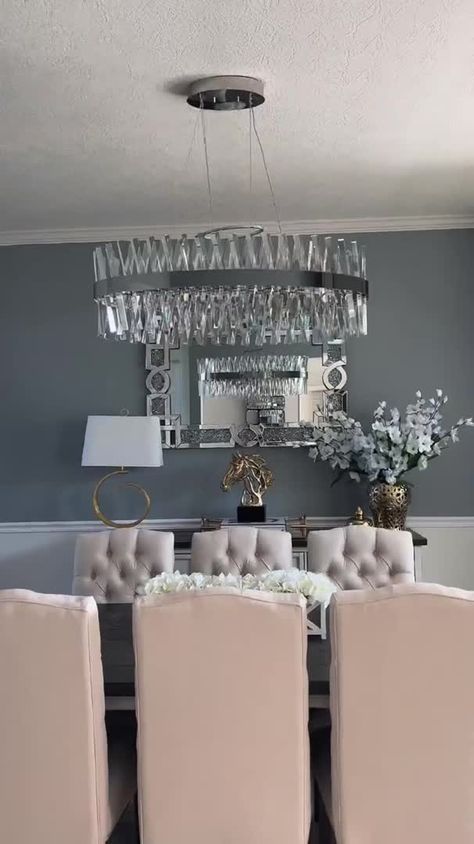 Light up your space with this stunning Nordic post-modern chandelier. Crafted with a minimalist design and adorned with beautiful, sparkling crystals, it imparts a luxurious feel to any room. Perfect for kitchens and dining rooms, this chandelier adds upscale elegance to any space. Voltage 110V-120V/ 220V-240V Material Crystal,Iron Light Fixture Form Chandelier Style Post-Modern Light Source LED Bulb Included Or Not Yes Dimmable Yes Sloped Ceiling Adaptable: Yes Light Direction Ambient Irradiati Dining Room Design Minimalist Modern, Formal Dining Room Light Fixtures, Dining Room Mirror Decor, Coffered Ceiling Dining Room, Elegant Dinning Room, Dining Room Elegant, Luxury Dining Room Decor, Model Home Decorating, Glam Dining Room